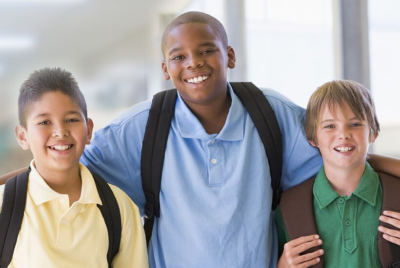 kids with backpacks on